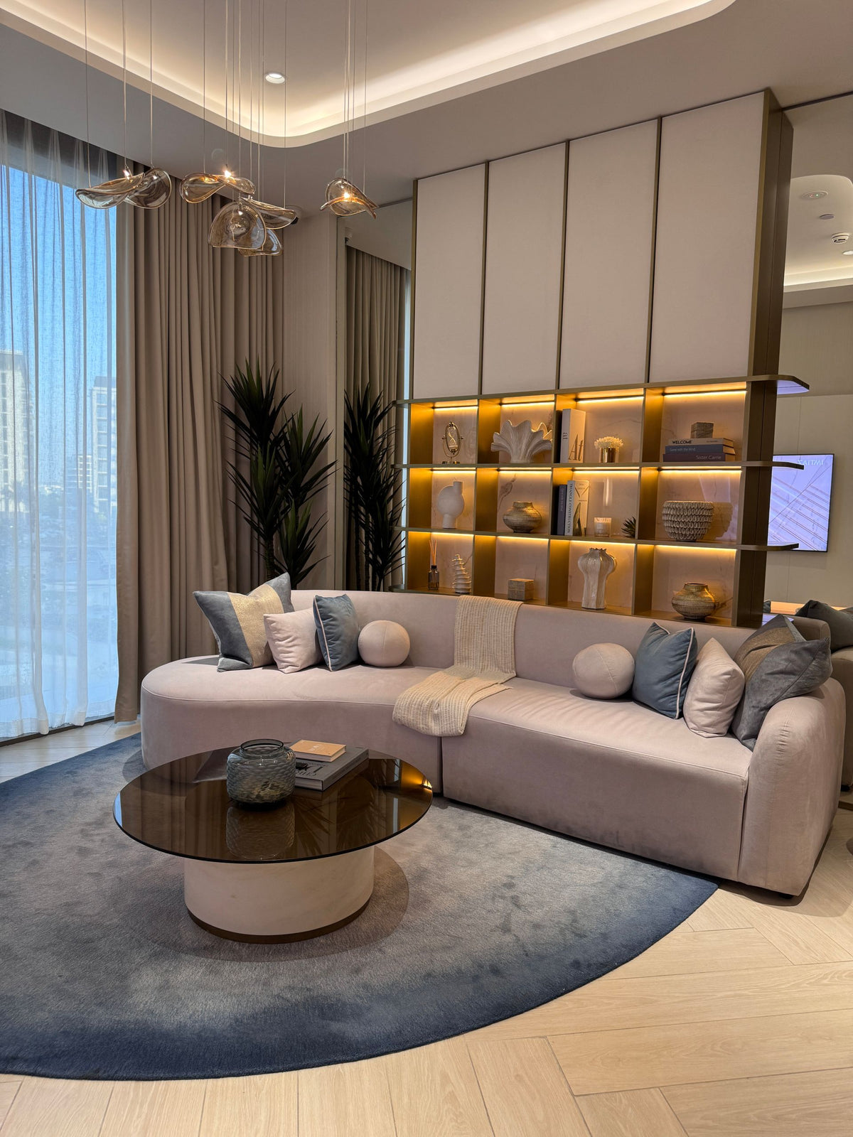 How to Style Illuminated Shelving in a Luxury Living Room